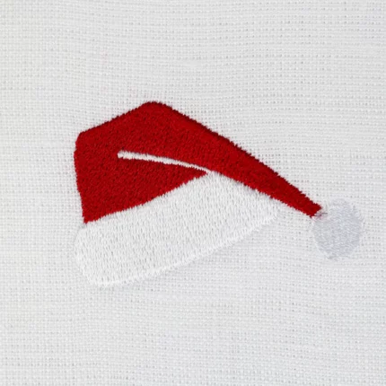 Lniana serweta - śnieżnobiała z haftem czapka Mikołaja